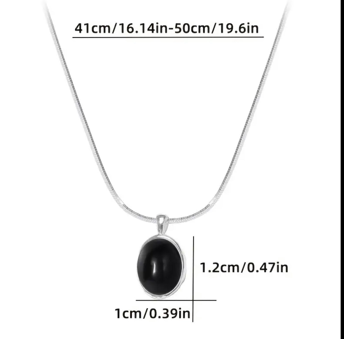 Une paire de pendentifs ovales minimalistes élégants